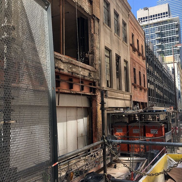 Scaffolding erected along the rear elevation of a historic building under renovation