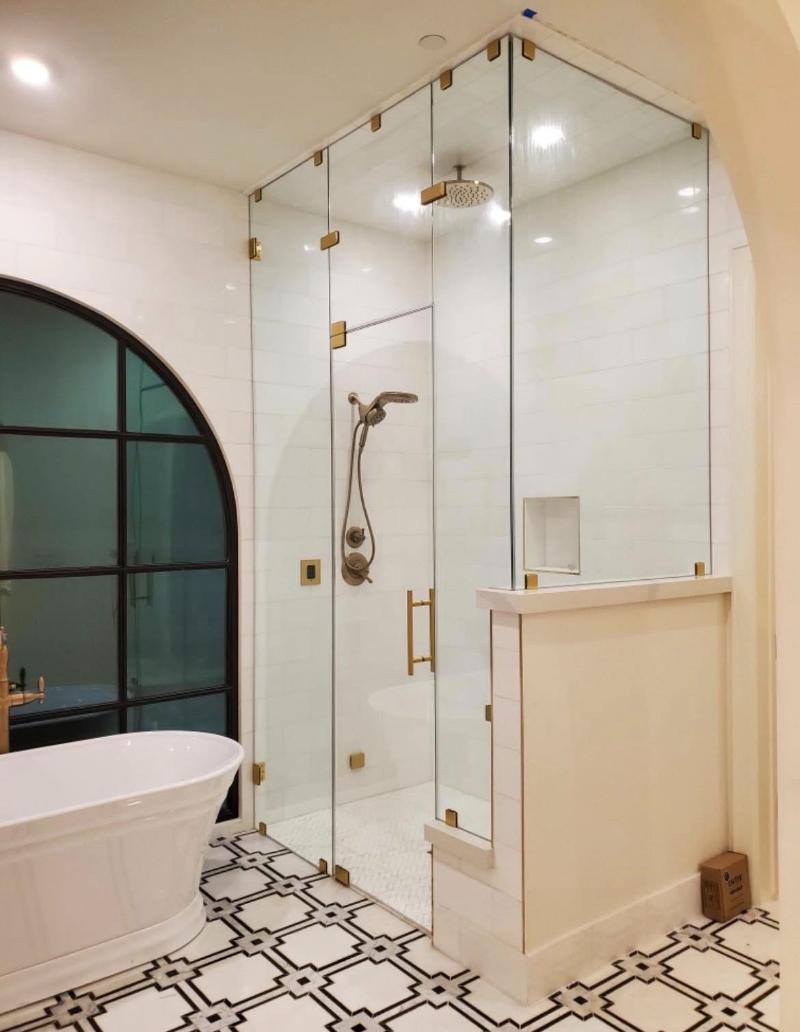 Frameless 90-degree steam shower enclosure with transom in Austin, TX