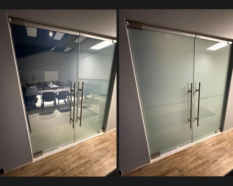 Electronic switch glass double door office partition with vertical pull handles in Schertz, TX