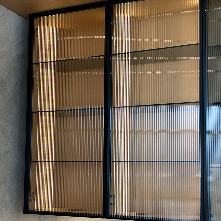 Reeded Glass Cabinet Doors Reeded glass cabinet door inserts in a built in cabinetry run
