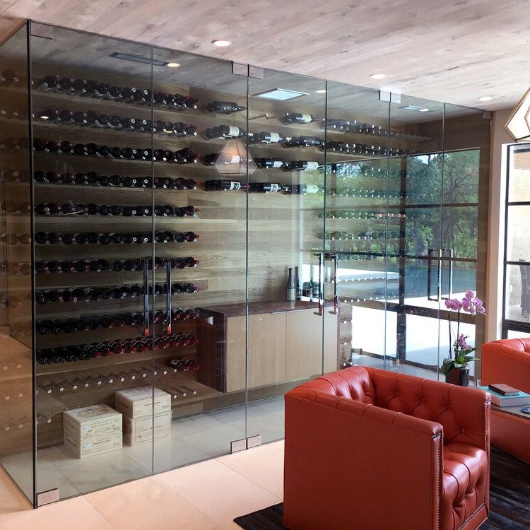 Frameless glass wine room enclosure with floor-to-ceiling panels